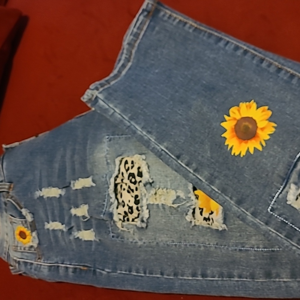 Woman's sunflower blue jeans large